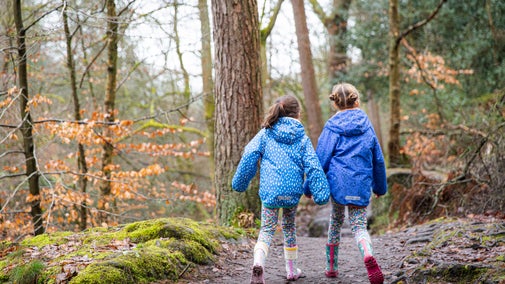 Family on a woodland walk at Hardcastle Crags, West Yorkshire